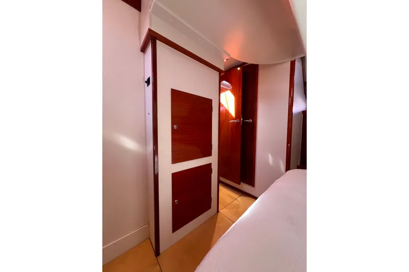 The Jonathan Shepard Yacht Photos Pics Interior of 2006 Hanse 461e yacht with wooden cabinetry and modern design.