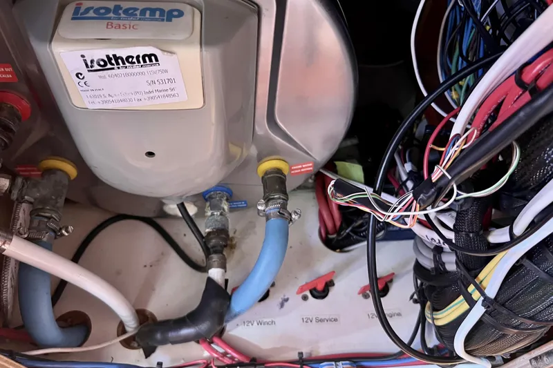 The Jonathan Shepard Yacht Photos Pics Electrical and plumbing system inside a 2006 Hanse 461e yacht, featuring Isotemp components.