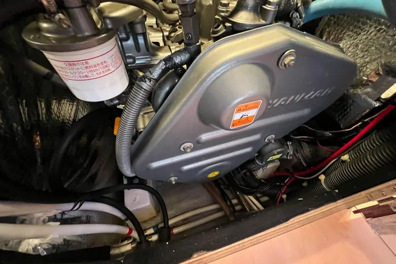 The Jonathan Shepard Yacht Photos Pics Engine compartment of a 2006 Hanse 461e sailboat, showcasing mechanical components.