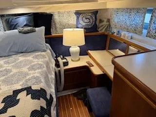 Grace Yacht Photos Pics Interior of 1995 Carver 440 Aft Cabin Motor Yacht with cozy bedroom setup.