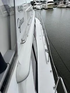 Grace Yacht Photos Pics 1995 Carver 440 Aft Cabin Motor Yacht docked at marina.