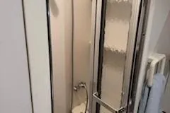 Grace Yacht Photos Pics Shower area in 1995 Carver 440 Aft Cabin Motor Yacht.