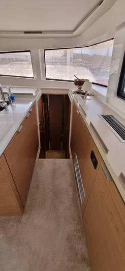  Yacht Photos Pics Interior of 2024 Bali 5.4 yacht with modern kitchen and hallway view.
