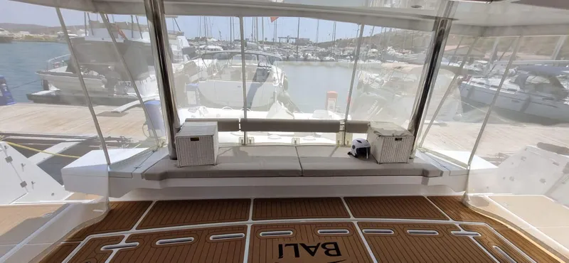  Yacht Photos Pics 2024 Bali 5.4 yacht interior with spacious seating and marina view.