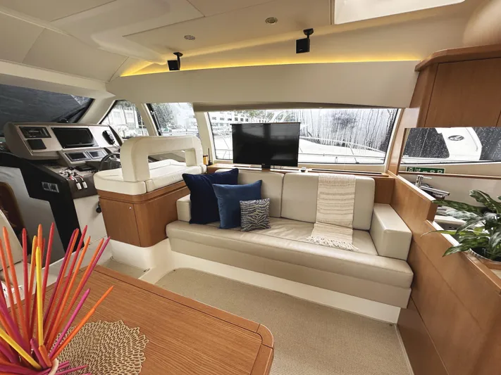Primo Yacht Photos Pics Luxurious interior of 2014 Ferretti Yachts 530 with modern seating and elegant decor.