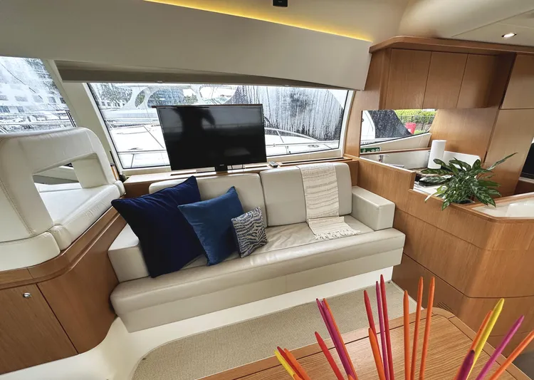 Primo Yacht Photos Pics Luxurious interior of 2014 Ferretti Yachts 530 with modern seating and decor.