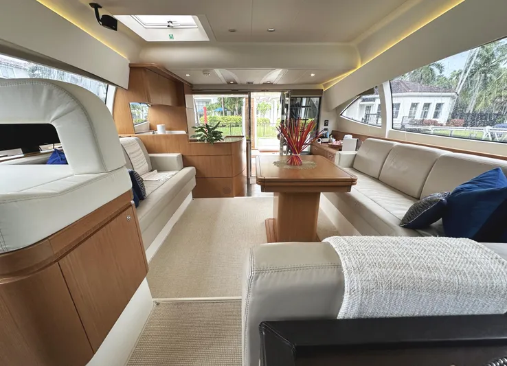 Primo Yacht Photos Pics Luxurious interior of 2014 Ferretti Yachts 530 with elegant seating and modern design.