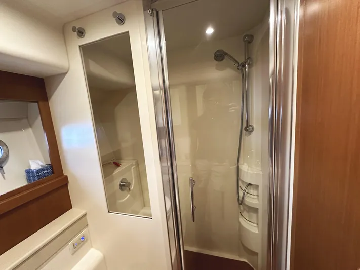 Primo Yacht Photos Pics Luxurious bathroom in 2014 Ferretti Yachts 530 with modern shower and sleek design.