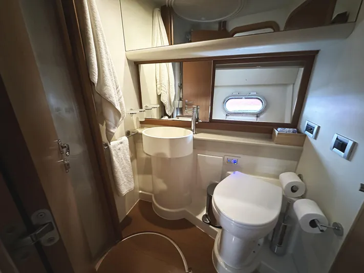 Primo Yacht Photos Pics Luxurious bathroom in 2014 Ferretti Yachts 530, featuring modern fixtures and elegant design.
