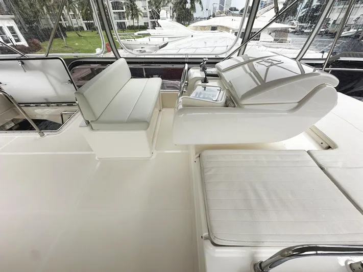 Primo Yacht Photos Pics Ferretti Yachts 530, 2014 model, luxurious white interior with seating and helm station.