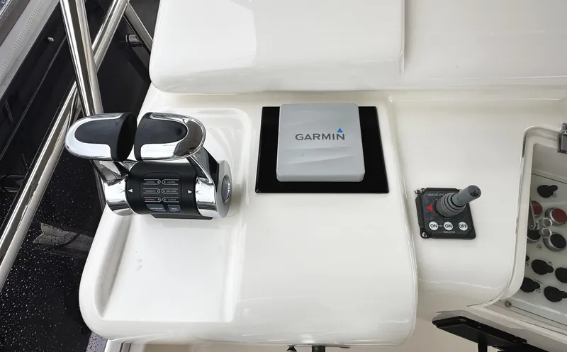 Primo Yacht Photos Pics Control panel of 2014 Ferretti Yachts 530 with Garmin navigation system.