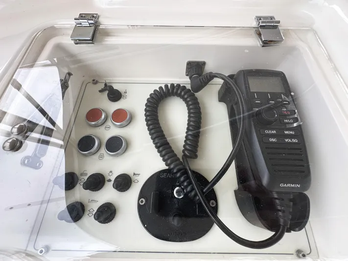 Primo Yacht Photos Pics Control panel of a 2014 Ferretti Yachts 530 with Garmin radio and switches.