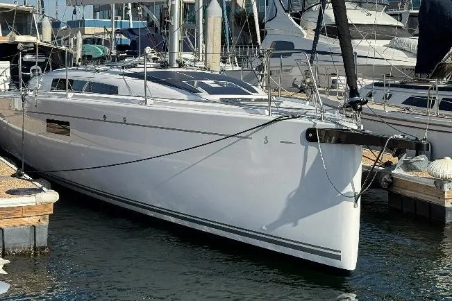  Yacht Photos Pics 2023 Beneteau First 36 sailboat docked in marina, sleek design, modern features.