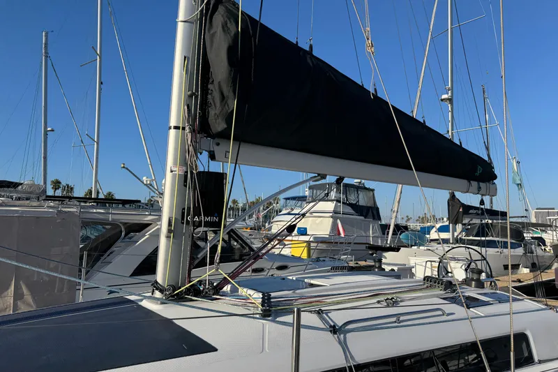  Yacht Photos Pics 2023 Beneteau First 36 sailboat docked in marina, featuring sleek design and modern rigging.