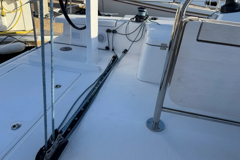  Yacht Photos Pics 2023 Beneteau First 36 yacht deck with ropes and winch system.
