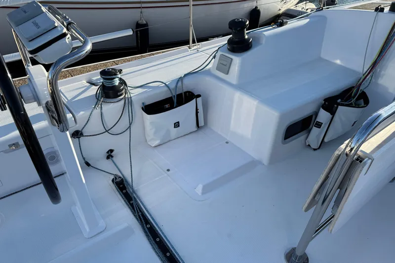  Yacht Photos Pics 2023 Beneteau First 36 yacht cockpit with winches and steering wheel.