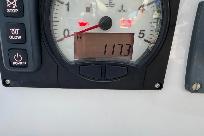  Yacht Photos Pics Dashboard of 2023 Beneteau First 36 showing 117.3 hours on engine meter.