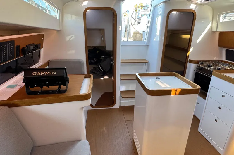  Yacht Photos Pics Interior of 2023 Beneteau First 36 sailboat with modern design and Garmin navigation system.