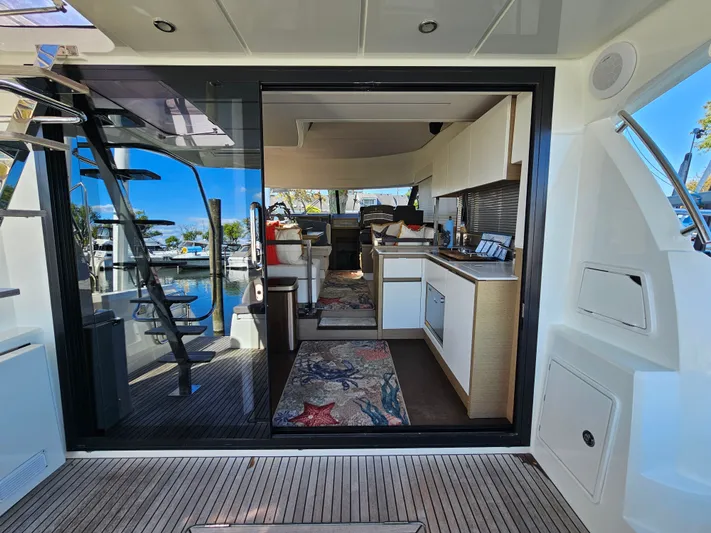 Margie Yacht Photos Pics Interior view of a 2018 Prestige 460 yacht at the marina.