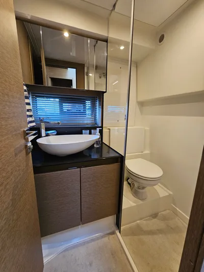 Margie Yacht Photos Pics Luxurious bathroom on a 2018 Prestige 460 yacht.