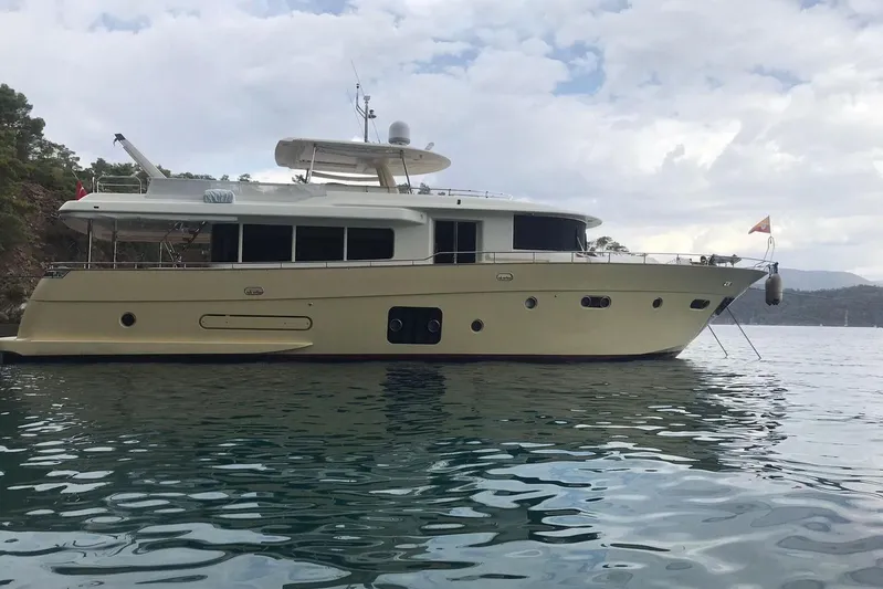 Yacht Photos Pics Luxury 2013 Apreamare 82 yacht anchored in serene waters, side view.