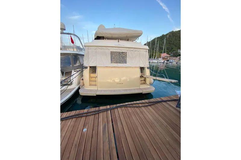  Yacht Photos Pics Luxury 2013 Apreamare 82 yacht docked at marina, rear view.