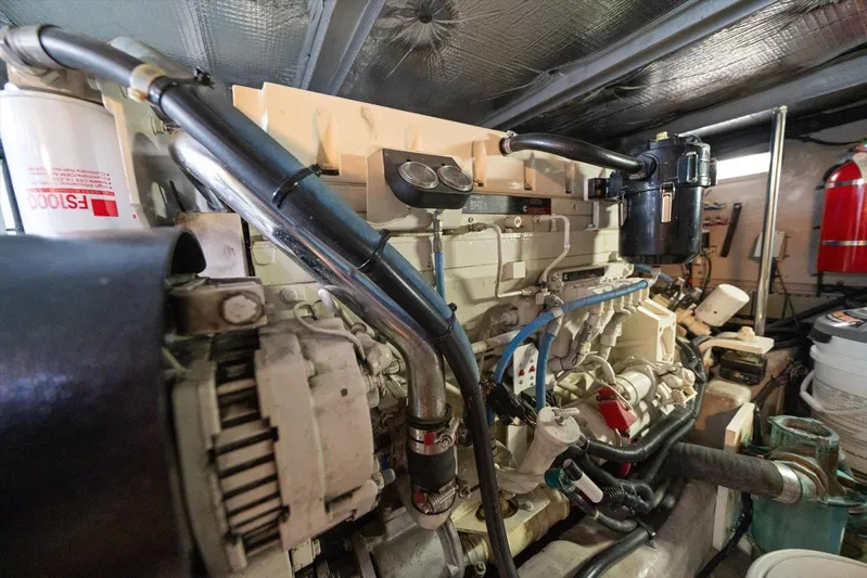 Free Bird Yacht Photos Pics Engine room of 2003 Sea Ray 480 Motor Yacht, showcasing mechanical components and systems.