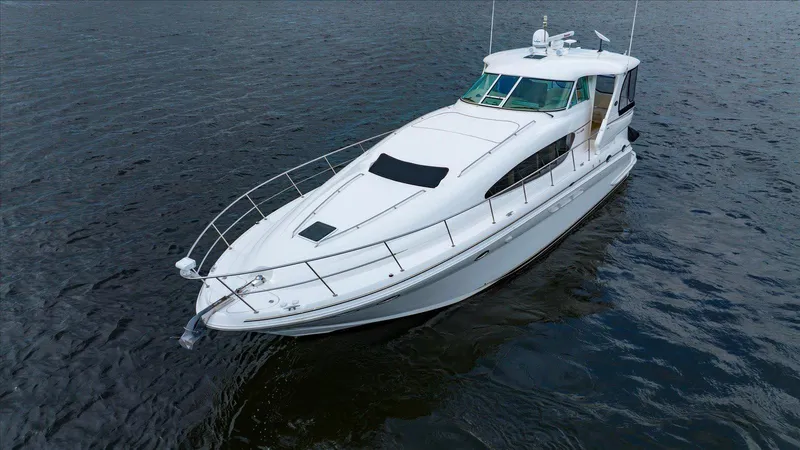 Free Bird Yacht Photos Pics 2003 Sea Ray 480 Motor Yacht cruising on calm waters.