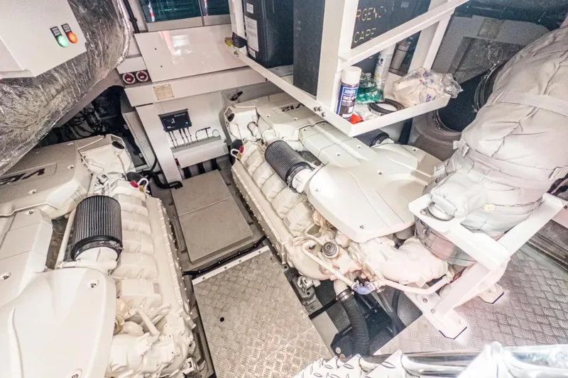  Yacht Photos Pics Engine room of 2020 Sunseeker Predator 74 yacht, featuring dual engines and equipment.