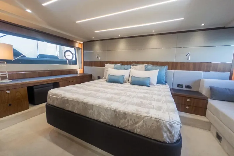  Yacht Photos Pics Luxurious interior of 2020 Sunseeker Predator 74 yacht with elegant bedroom design.