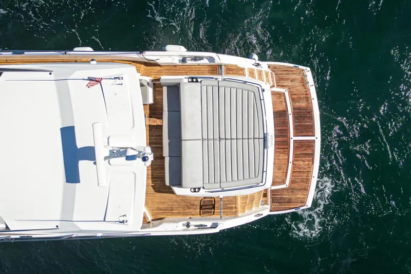  Yacht Photos Pics Aerial view of 2020 Sunseeker Predator 74 yacht on water.