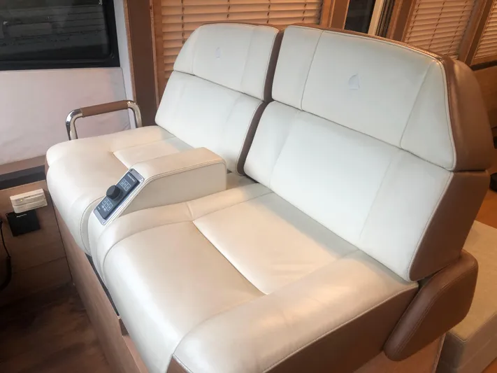 Rebellion Yacht Photos Pics Luxurious leather seating in 2012 Monte Carlo Yachts 76 model.