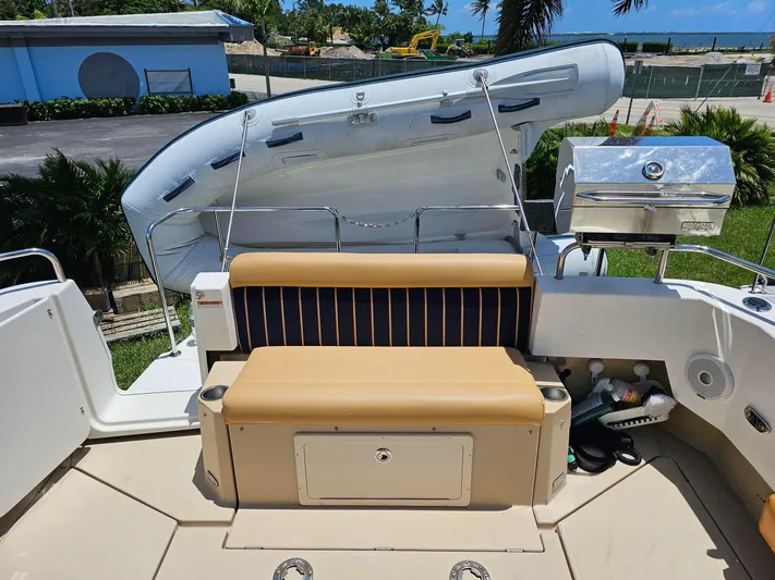  Yacht Photos Pics 2014 Ranger Tugs 31-CB boat deck with seating, grill, and storage.