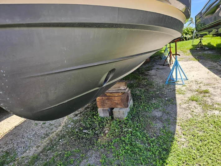  Yacht Photos Pics 2014 Ranger Tugs 31-CB boat hull on blocks, outdoor storage.
