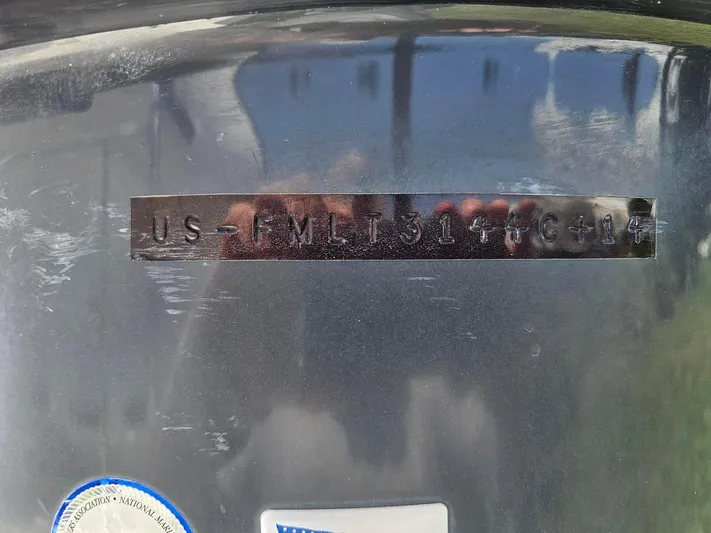  Yacht Photos Pics 2014 Ranger Tugs 31-CB hull identification number on metallic surface.