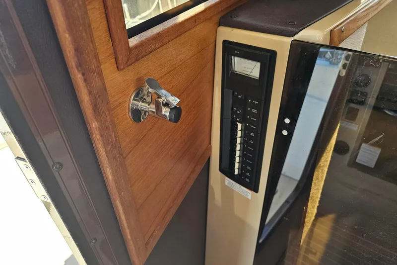  Yacht Photos Pics 2014 Ranger Tugs R 31 interior with control panel and wooden finish.