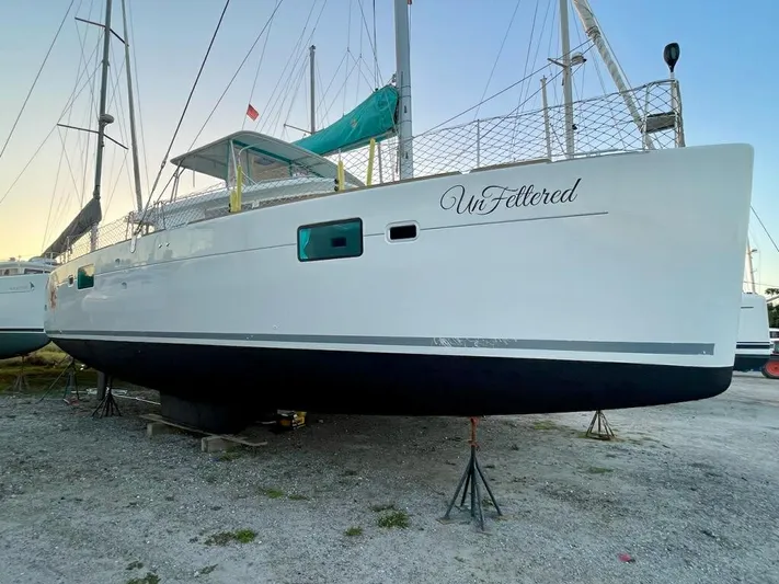 Unfettered Yacht Photos Pics 2015 Lagoon 450 F catamaran named "UnFettered" on dry dock.