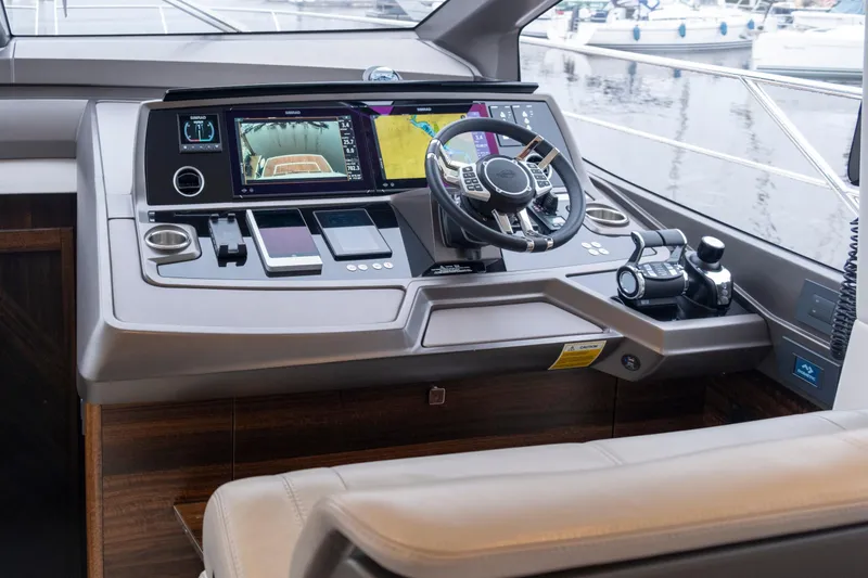 Baillies Yacht Photos Pics Helm of 2021 Sunseeker Manhattan 68 yacht with advanced navigation controls.