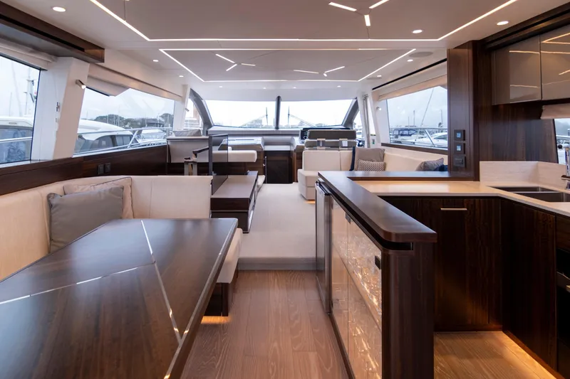 Baillies Yacht Photos Pics Luxurious interior of 2021 Sunseeker Manhattan 68 yacht with modern design and spacious layout.