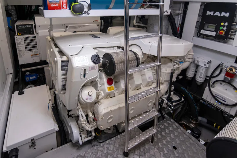 Baillies Yacht Photos Pics Engine room of 2021 Sunseeker Manhattan 68 yacht, featuring advanced machinery and equipment.