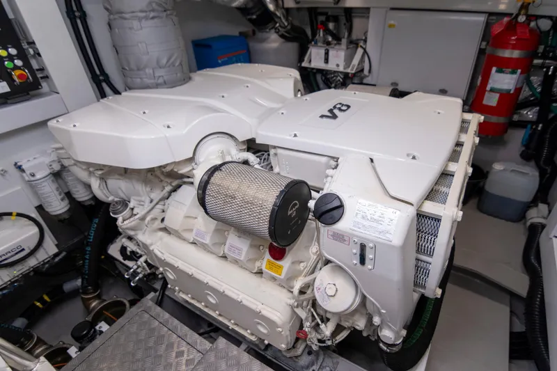 Baillies Yacht Photos Pics Engine room of 2021 Sunseeker Manhattan 68 yacht featuring a powerful V8 engine.