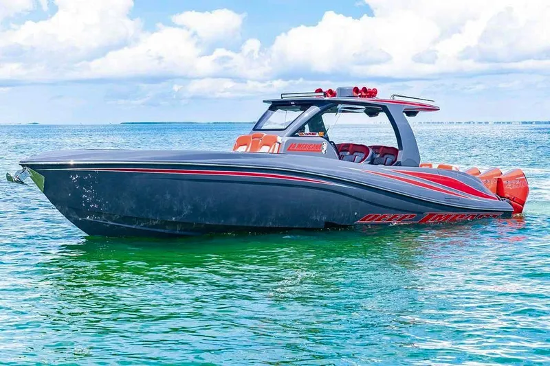  Yacht Photos Pics 2022 Deep Impact 399 Sport boat on clear blue water under a bright sky.