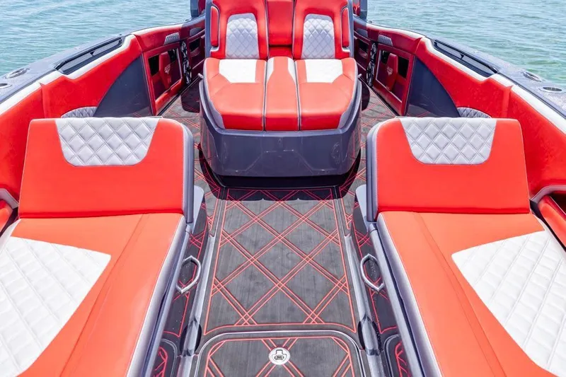  Yacht Photos Pics Luxurious 2022 Deep Impact 399 Sport boat interior with red and white seating.
