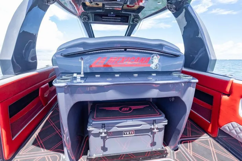  Yacht Photos Pics 2022 Deep Impact 399 Sport boat interior with sleek design and vibrant red accents.