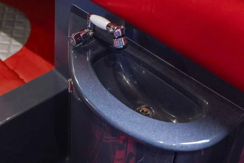  Yacht Photos Pics Luxury sink in 2022 Deep Impact 399 Sport boat, featuring sleek design and modern fixtures.