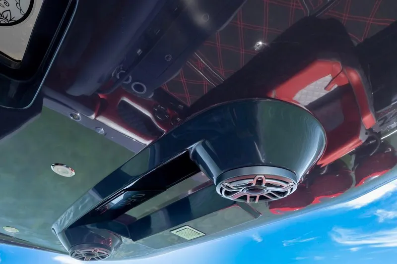  Yacht Photos Pics 2022 Deep Impact 399 Sport boat interior with sleek design and modern audio system.