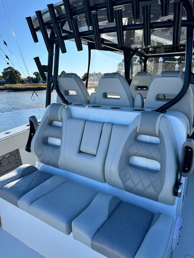  Yacht Photos Pics Luxurious seating on 2024 Wyatt and Freeman 42LR boat, featuring sleek design and comfort.