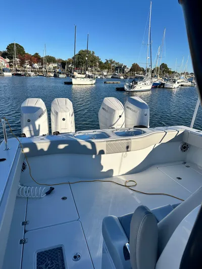  Yacht Photos Pics 2024 Wyatt and Freeman 42LR boat with Mercury engines docked in a marina.