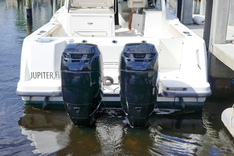 Mr Ceo Yacht Photos Pics 2015 Boston Whaler 315 Conquest with dual outboard engines, docked in Jupiter, FL.