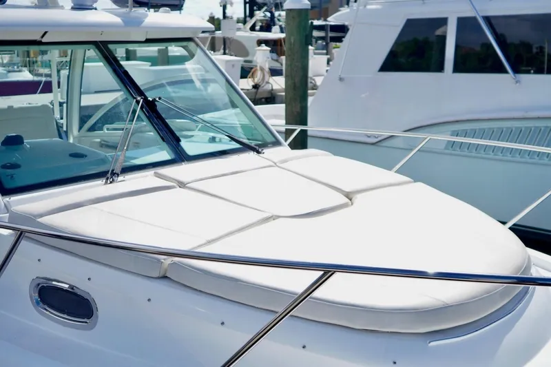 Mr Ceo Yacht Photos Pics 2015 Boston Whaler 315 Conquest boat docked, featuring sleek design and spacious deck.